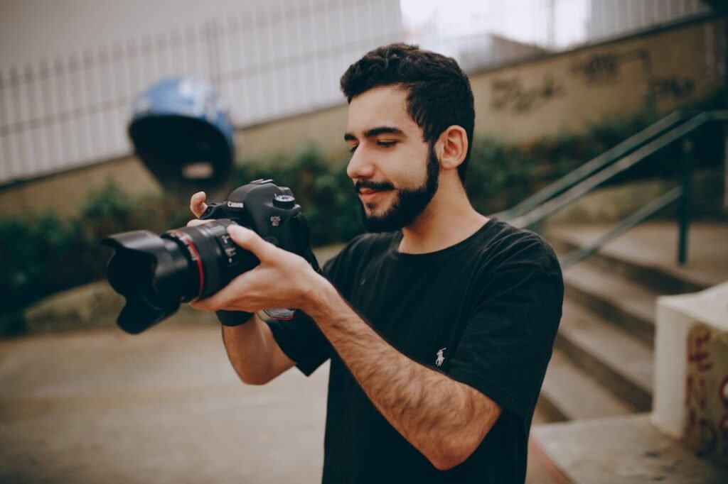 pexels-photo-1728163 Photo of Man Taking Photo Using a Dslr Camera